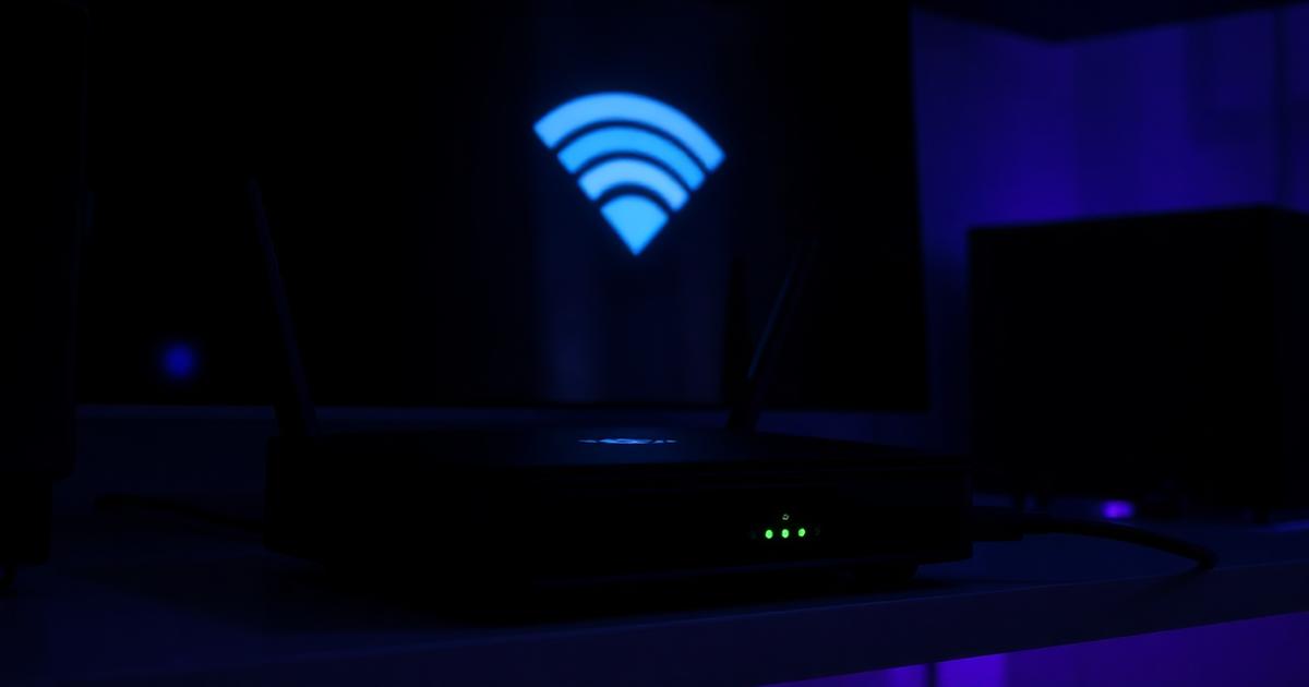 Roteador Wi-Fi com luzes acesas ao lado da TV, representando travamentos de IPTV